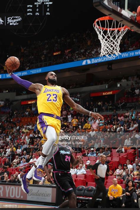 Lebron James Of The Los Angeles Lakers Dunks The Ball Against The