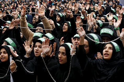 Ashura 2015 Shia Muslims Flagellate Themselves With Swords Chains And