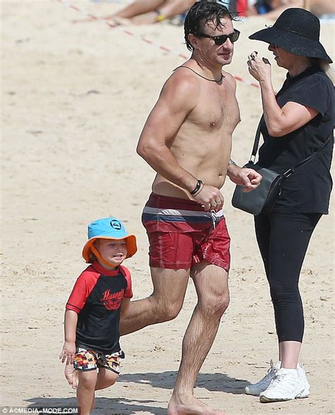 Neighbours Star Damian De Montemas Takes His Son To The Beach Daily Mail Online