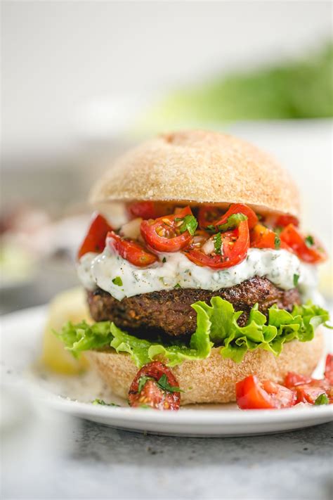 Juicy And Tender Grilled Lamb Burgers Topped With A Fresh Flavored
