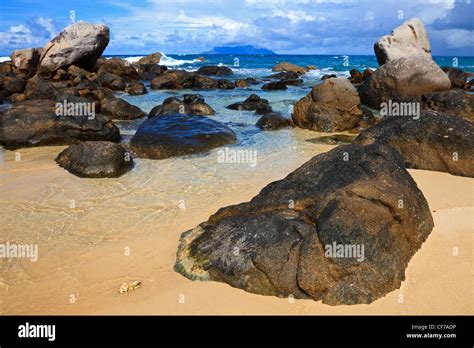 Near Sunset Beach Mahe Seychelles Showing The Granite Rock Formations