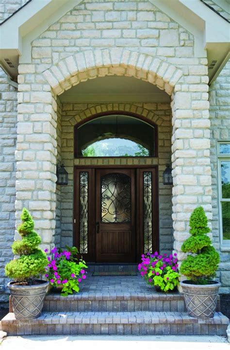 If you're looking to frame your front door with plants, these ideas will inspire you, from shady porches perfect for english ivy to sunny entrances where cacti will thrive. Front Door Flower Pots That Will Mesmerize Everyone