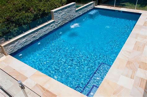 Water descent is one of the most beautiful ornamental features for your pool or spa. Sheer descent waterfall - Wahroonga - Crystal Pools