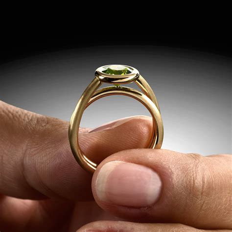 Peridot Ring Spiralring Aus Gelbgold Steinbach Goldschmiede