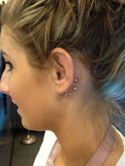 The sound of the tattoo gun buzzing. Triple dermal behind the ear. Cool spot, i never thought ...
