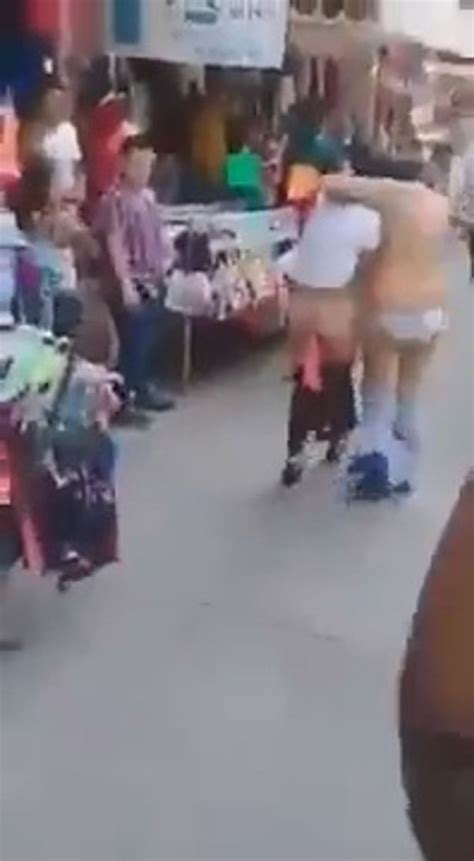 Angry Mob Tear Clothes Off Two Women Suspected Of Shoplifting And Cut