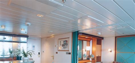 Manufacturers of contemporary and classic decorative pressed metal panels suitable for a wide variety of ceiling and wall installations. Panel ceilings - Lautex Oy