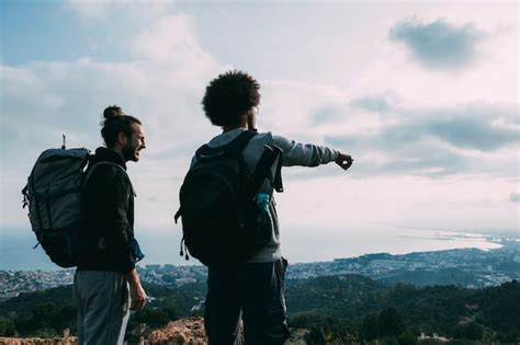 Two Friends Hiking Together Free Photo