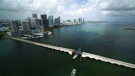 Miami Bridge With Downtown Miami In The Background By Aerial Drone