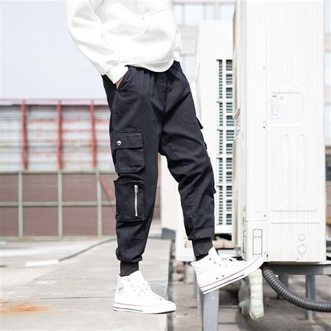 Men's wide leg pants offer a more relaxed fit for individuals with large thighs, however they also add a touch of sartorial flair to an otherwise standard and boring outfit. Men Spring Fashion Korea Safari Style Vintage Multi pocket ...