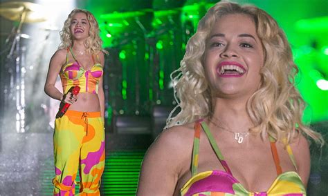 Rita Ora Shows Off Her Toned Midriff In Multi Coloured Neon Cropped Top