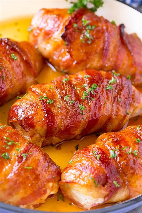 Bacon Wrapped Chicken Breast With Sauce In A Skillet Bacon Wrapped