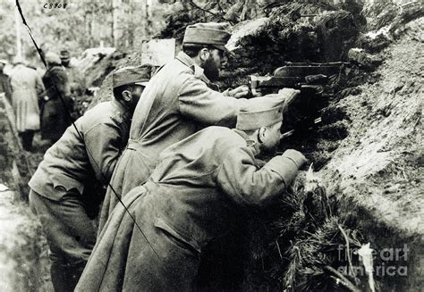 Austrian Soldiers Firing Machine Guns By Bettmann