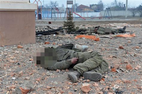 Ukrainian Officials Post Photos Of Dead Russian Soldiers Online