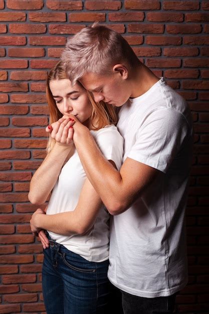 Free Photo Front View Woman Kissing Her Boyfriends Hand
