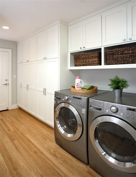 Laundry and utility rooms seem to collect clutter like magnets to metal. Wood flooring in laundry room