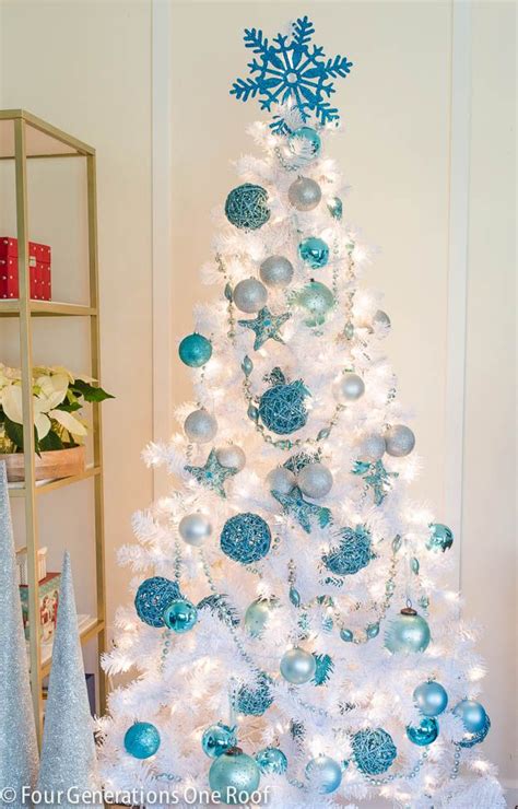 The colors silver and white are the best colors to remember winter days. Our cute blue + white Christmas tree | White christmas ...