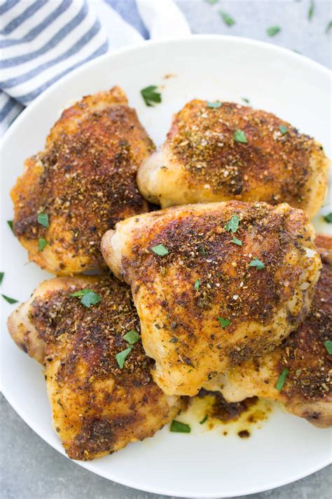Add chicken thighs to the bowl and coat both sides. Best Baked Chicken Thighs - Crispy & Juicy!