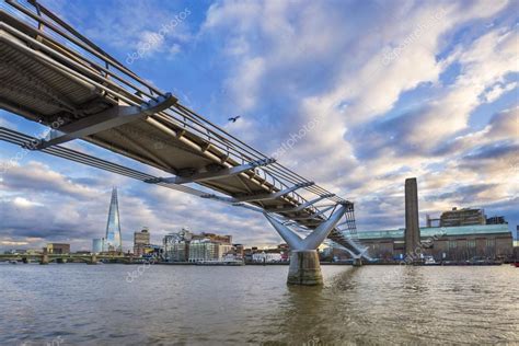 Millennium Bridge On River Thames With Beautiful Blue Sky And Clouds