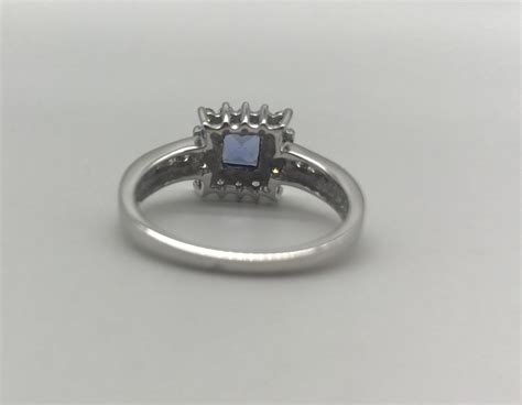 18ct White Gold Diamond And Princess Cut Blue Sapphire Ring
