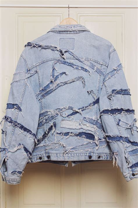 upcycled denim jacket light blue denim light mid and dark blue denim scraps are attached in