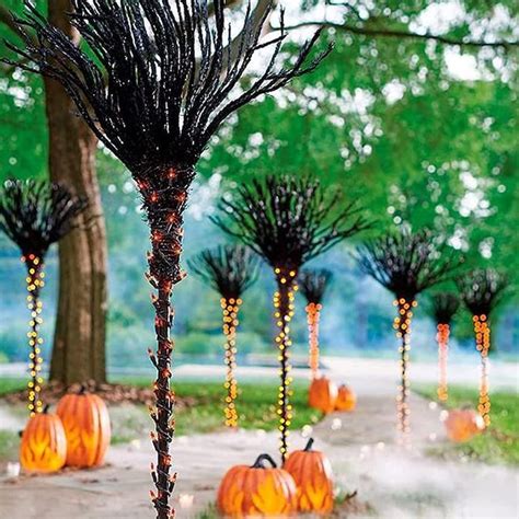 These Light Up Witch Broomstick Pathway Markers Stand Over 3 Feet Tall