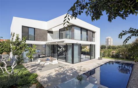 A modern home plan typically has open floor plans, lots of windows for natural light and high, vaulted ceilings somewhere in the space. Simple modern house with an amazing floating stairs ...