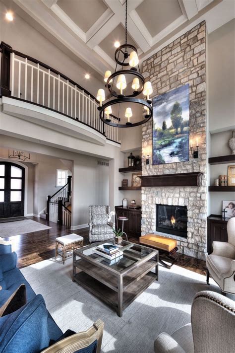 Great Room Open Floor Plan Floor To Ceiling Stone Fireplace Overlook
