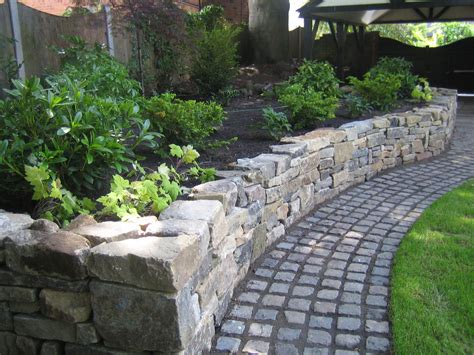 Dressed Dry Stone Raised Planting Bed And Granite Cobbled Sett Path