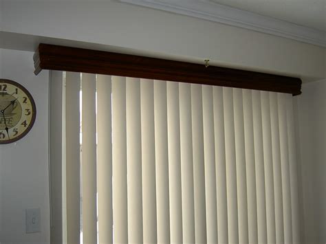 Vertical blinds cover more windows in the world than any other type of blind or shade! vertical blind with wood valance | Flickr - Photo Sharing!