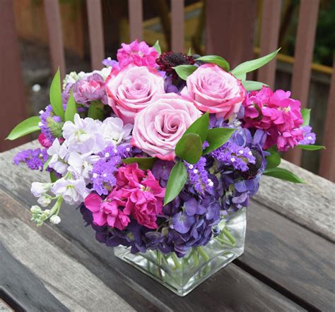 See more ideas about flower arrangements, arrangement, floral arrangements. Flower arrangement with jewel tones of flowers ...