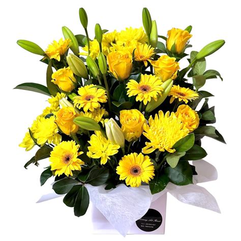 Gorgeous Yellow Flowers In A Box Yellow Flowers In A Box Blooming Art