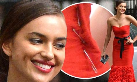 Irina Shayk Avoids A Wardrobe Malfunction In Stunning Scarlet Dress