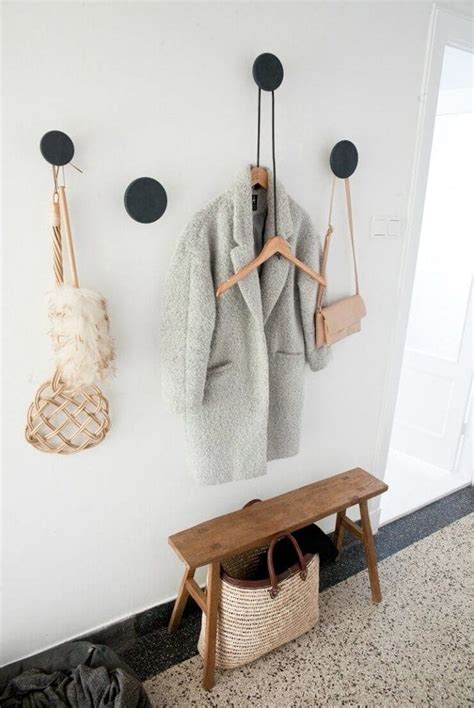They can even be decorated with pillows for an added touch of pattern and color. Affordable Ways to Elevate Your Hallway Design - TLC Interiors