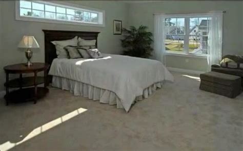 Spacious living room with lots of windows another picture of the living room master bedroom looking towards the closet ensuite with large vanity and. How to treat transom window over bed