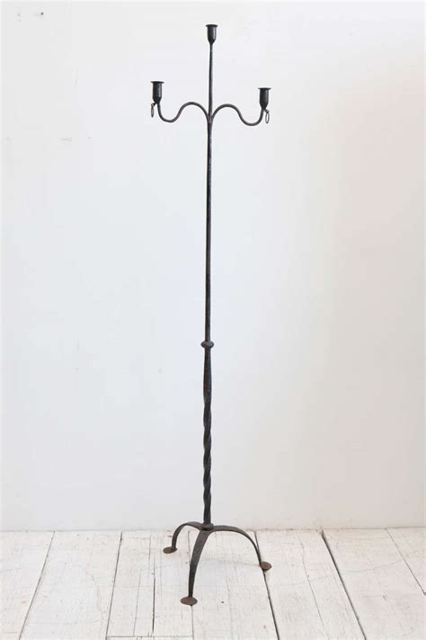 Floor candle holders look even better when you pair. Floor Length Iron Candelabra at 1stdibs