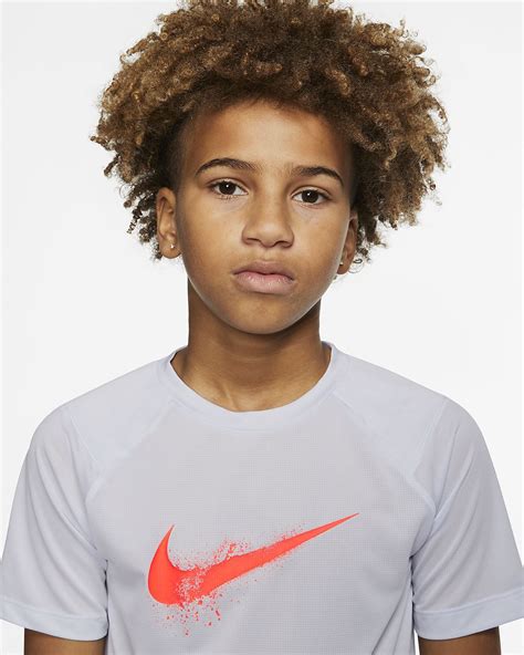 Nike Big Kids’ (Boys’) Short-Sleeve Graphic Training Top. Nike.com