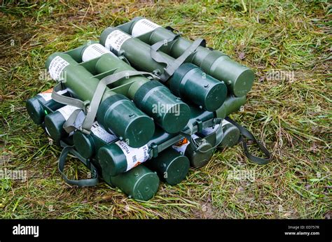 British Army 81mm Mortar Rounds In Their Containers Stacked Stock Photo