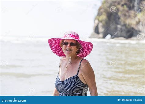A Beautiful Mature Senior Woman On The Beach Stock Image Image Of