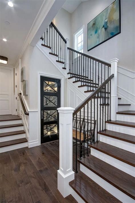 The Staircase Features White Oak Wood Treads And Custom Wrought Iron
