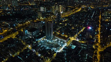 Download Wallpaper 1920x1080 City Buildings Lights Road Aerial View