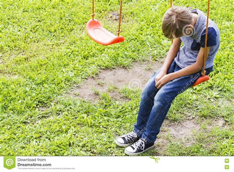 Sad Lonely Boy Sitting On Swings Stock Image Image Of Mischief
