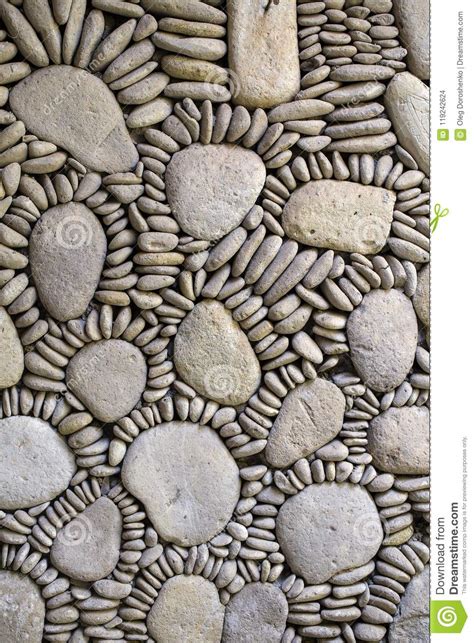 Background From High Detailed Fragment Pebble Stone Wall Texture Stock