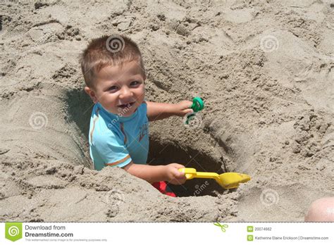 Boy Digging A Hole Stock Photography Image 20074662