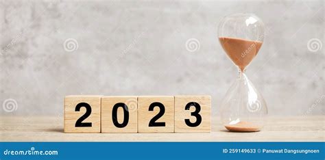 2023 Text with Hourglass on Table. Resolution, Time, Plan, Goal