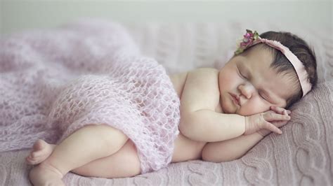 Cute Baby Girl Is Sleeping On Bed Covered With Netted Cloth And Having Band On Head Hd Cute