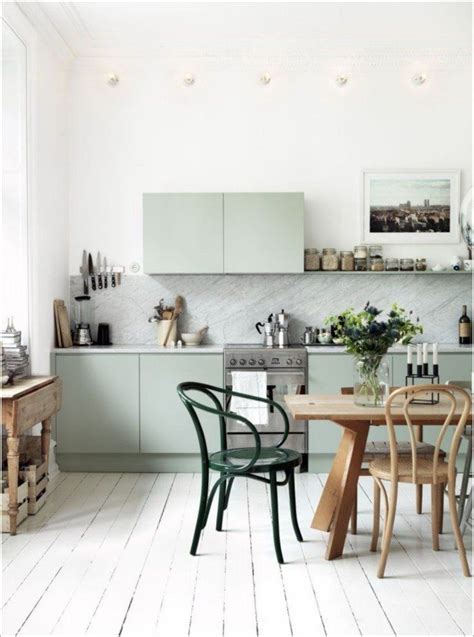 Bright white kitchen with household items. F12 Apartment: A New Flat with Minimalist Scandinavian ...