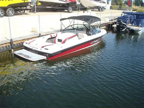 A powerboat built by malibu, the response is a ski and wakeboard vessel. Malibu Response Boats for sale