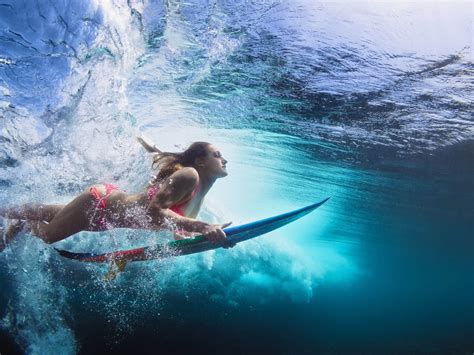 Surfer Girl Duck Dive Hawaii Best Beaches For Surfing