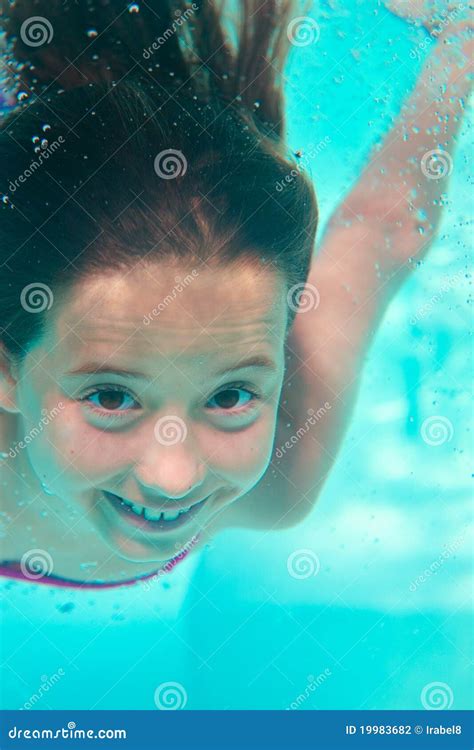 Underwater Girl Wearing Bikini In Swimming Pool Stock Photo